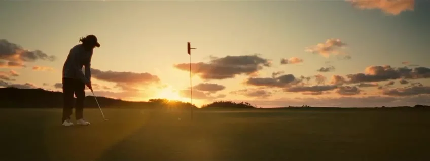 Putting at sunset
